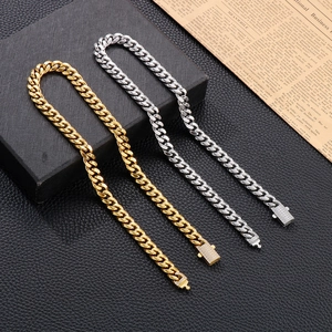 Hip hop Cuban link chain necklace set in gold and silver with iced out diamond clasp