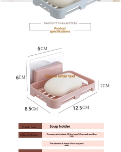 Detail of pink wall-mounted soap dish with dimensions and adhesive backing installation