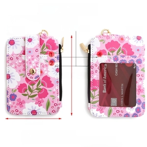 Detail showing dimensions and 4 card slots of pink floral wallet with ID window