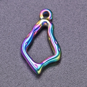 Macro view of irregular rainbow 304 stainless steel pendant with fluid line design