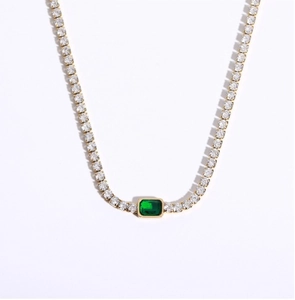 Detail of 18K gold-plated tennis choker with emerald-cut stone and pavé setting