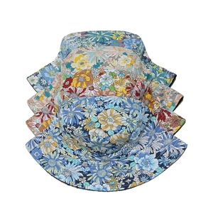 Floral print sun hats set featuring diverse sunflower patterns on cotton bucket hats