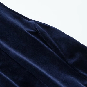 Detailed close-up of premium navy blue velvet fabric showing smooth texture and soft folds