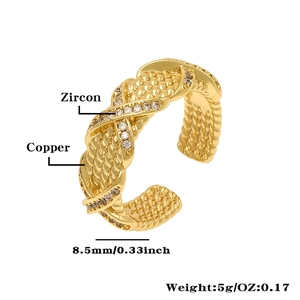Detail of copper twist ring with zircon, 8.5mm width and 18K gold plated finish