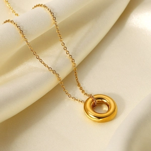 18K gold plated stainless steel necklace with zircon hollow ring pendant on silk