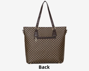 Detail view of the back side of a brown patterned tote bag featuring a horizontal zipper pocket