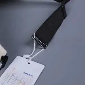 Detail of black elastic strap with cooling technology tag on an athletic sun visor hat