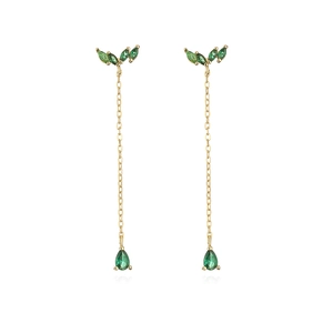 Detail of 18K gold tassels earrings featuring green marquise leaves and teardrop gems