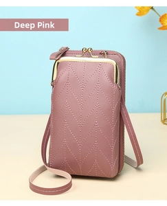 Detail view of Deep Pink vertical quilted crossbody phone bag with gold metal clasp