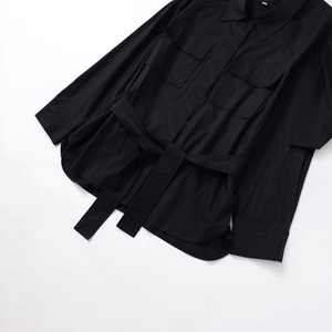 Women's black utility cargo shirt with long sleeves and matching waist belt