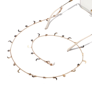 Gold star and moon glasses chain with silicone loops shown in heart-shaped arrangement