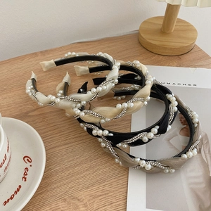 Braided pearl headband with twisted fabric texture in black beige and champagne gold