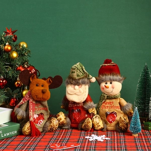 Three Christmas burlap gift bags featuring Santa, Reindeer and Snowman with heart windows