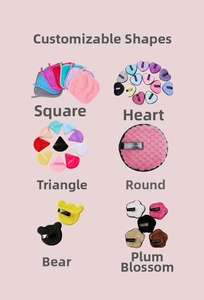 Variety of colorful pineapple grid makeup puffs in heart, bear, and geometric shapes