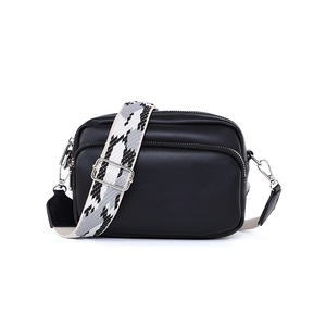 Minimalist black leather crossbody camera bag with adjustable geometric wide strap