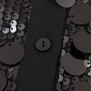 Elegant black sequin blouse featuring long sleeves and premium button details on the placket