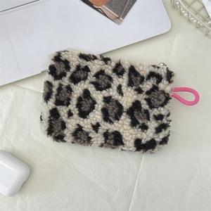 Plush leopard print coin purse with pink zipper pull for small essentials