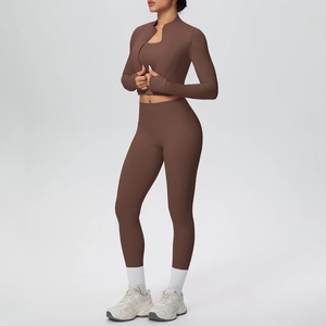 Detailed view of coffee brown three-piece yoga set with zip jacket and slim leggings