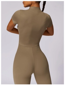 Detailed back view of short-sleeve yoga jumpsuit showing premium fabric texture