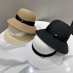 Elegant woven sun hats with ribbon and gold metal accents in four assorted colors