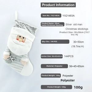 Detail of knitted Christmas stocking with 3D Santa Claus and silver sequin cuff trim