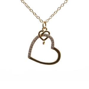 Golden heart necklace for women with zircon devil eye pendant on white background