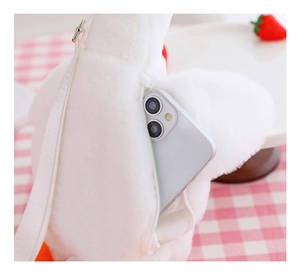 Detail view showing smooth zipper closure and spacious interior of the plush white goose bag
