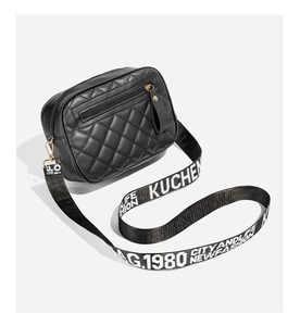 Rear view of black quilted camera bag with back zipper pocket and graphic wide strap