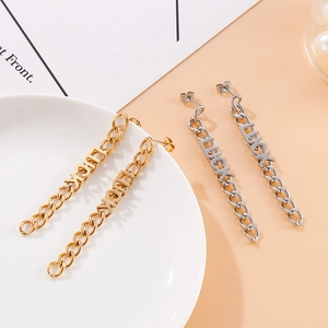 Orecchini pendenti a catena Luck in oro e argento con design geometrico a nappa per donna