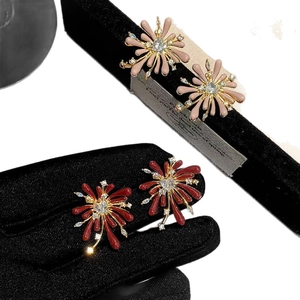 Elegant red enamel firework stud earrings with gold finish and zircon stones