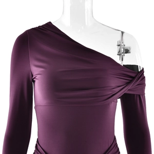 Detailed view of the dark purple one-shoulder evening dress with elegant pleated draping