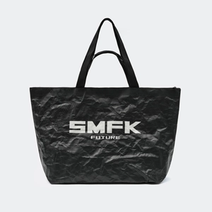 Detail of the large black gym bag with textured finish and white SMFK FUTURE logo