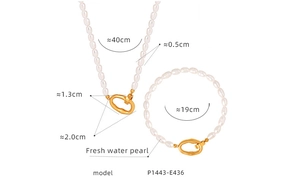 Detail view of freshwater pearl necklace and bracelet set with size measurements in cm
