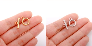 Detail view of gold and silver stainless steel OT toggles for DIY jewelry making