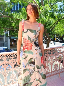 Close-up of vintage floral print and linen texture on square neck summer sundress