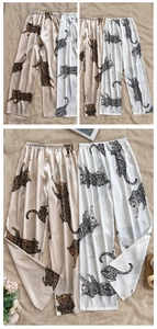 Detail of silk-like ice silk pajama pants with leopard print and elastic waistband
