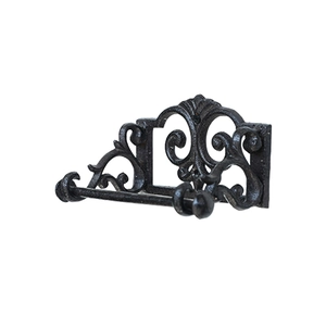 Vintage American cast iron towel holder with ornate scroll design in rustic black finish
