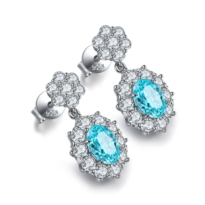 Oval Paraiba blue gemstone earrings in 925 sterling silver with halo diamond setting