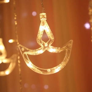 Warm yellow LED Diya curtain string lights for Diwali and holiday festival decoration