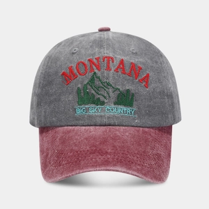 Detail of vintage Montana mountain embroidery on washed cotton baseball cap