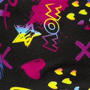 Black bucket hat with colorful graffiti heart and star prints in a street style design