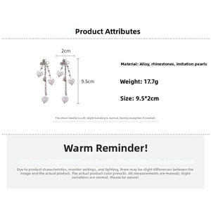 Dimensions détaillées des boucles d'oreilles cœur avec perles et strass