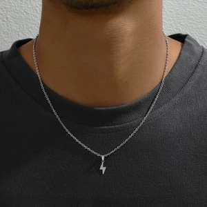 Men's stainless steel lightning bolt pendant necklace on a silver fine chain with model