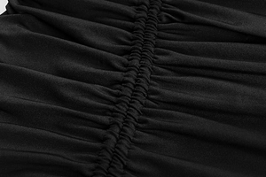 Macro shot of black dress fabric featuring elegant ruched drawstring detailing and texture