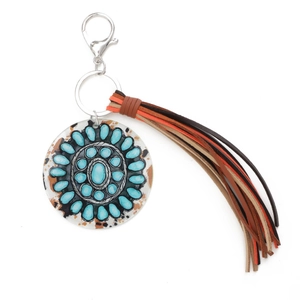 Acrylic keychain with sunflower and leopard print pendant featuring a colorful suede tassel