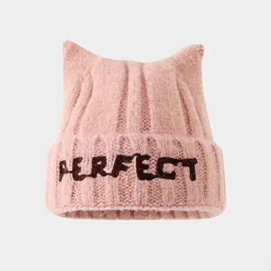 Pink knitted winter hat for children with cat ear design and Perfect embroidery