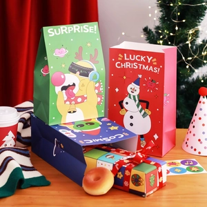 Cartoon Christmas gift bags featuring reindeer and snowman designs in festive home setting