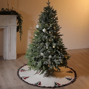 Cream knitted Christmas tree skirt with festive 3D pine tree patterns and ruffled borders