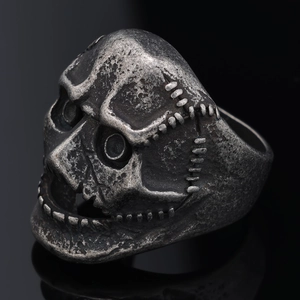 Gothic skull ring in vintage silver finish with detailed stitched face mask carvings