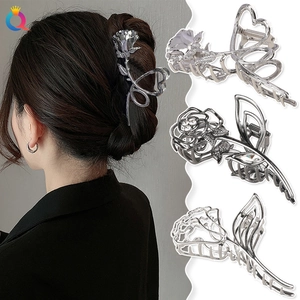 Silver metal rose hair claw clips set showing model wear and detailed floral designs